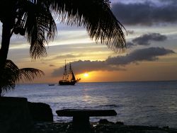 I took this shot of the sun setting from behind the Carib... by Robyn Churchill 